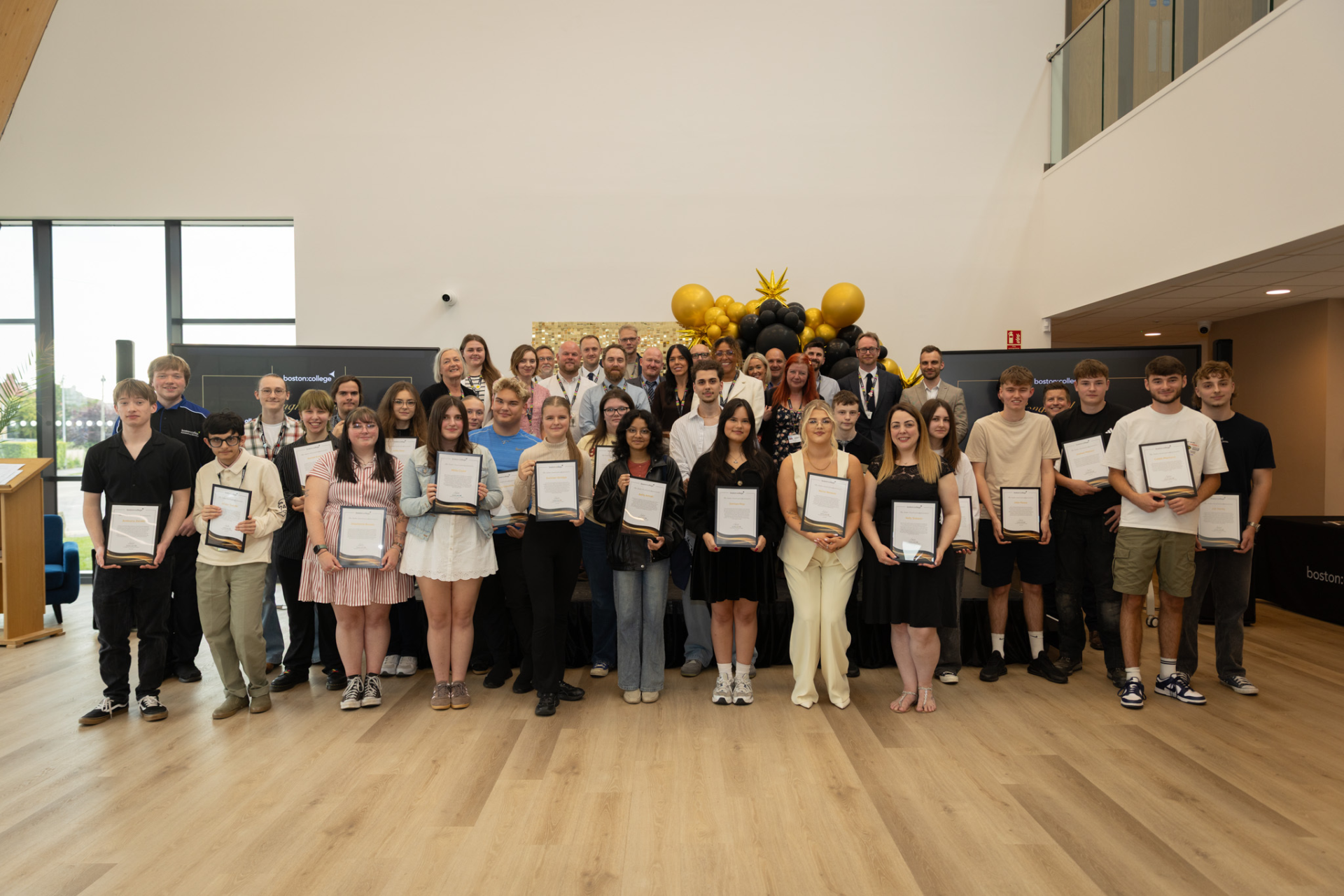 Students with Boston College staff at Student Awards 2026