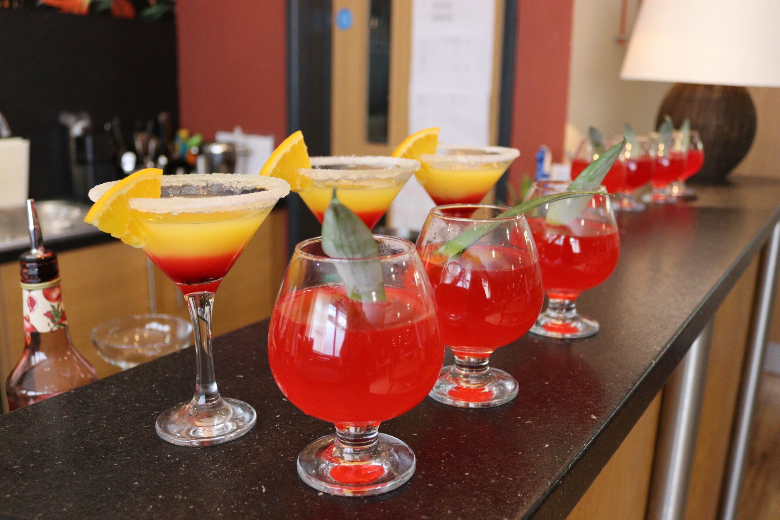 Cocktails lined up on a table in Eden restaurant.