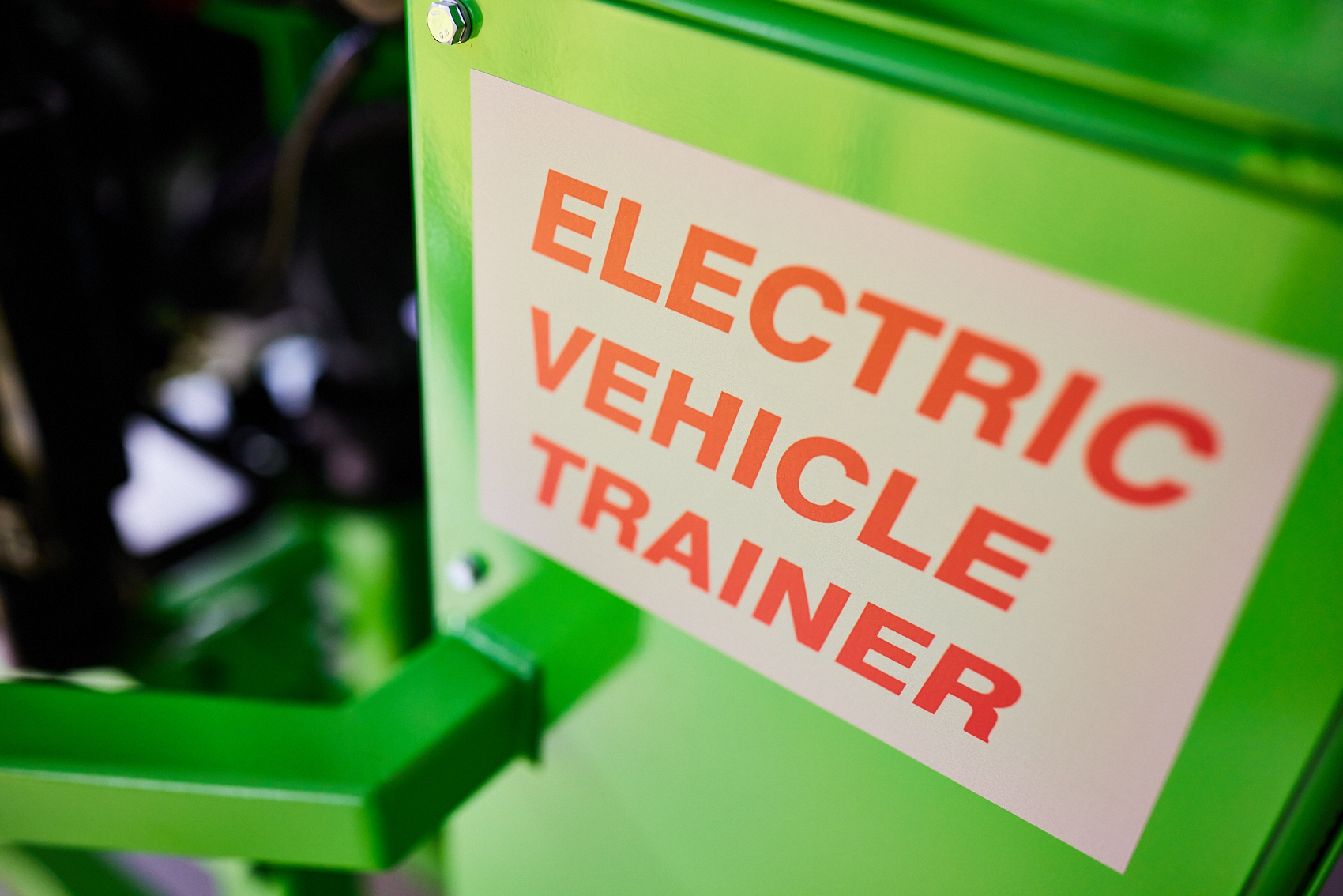 Electric Vehicle Trainer sticker.