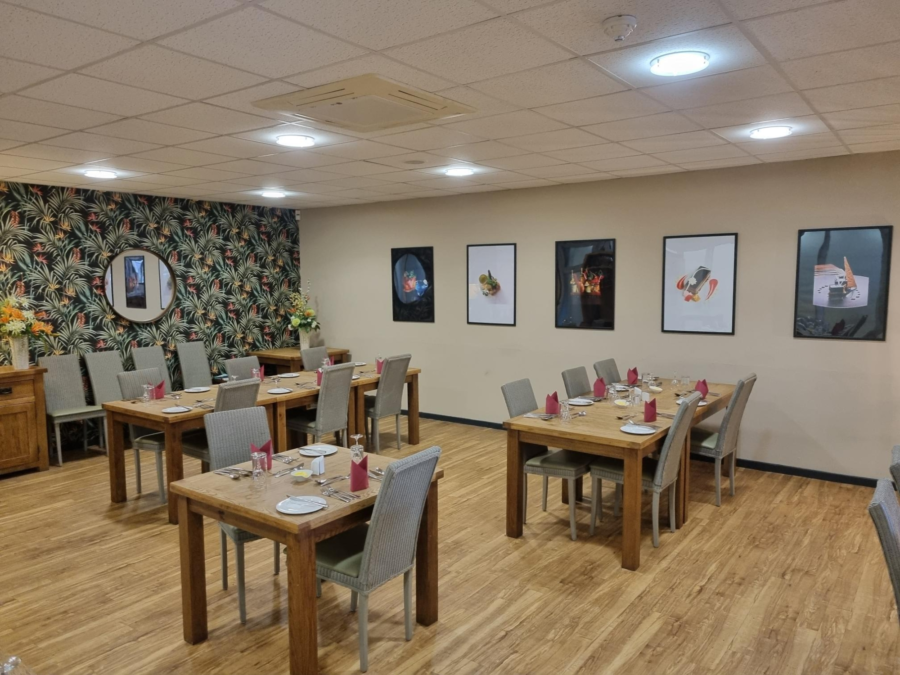 Interior of Eden Restaurant showing set tables.