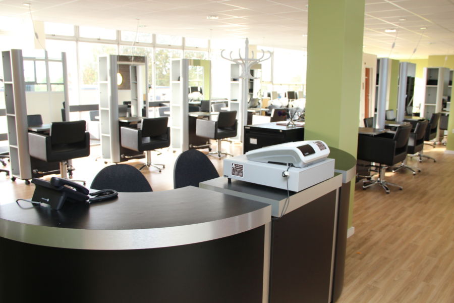 Main reception at the salon in the background at Style Academy.