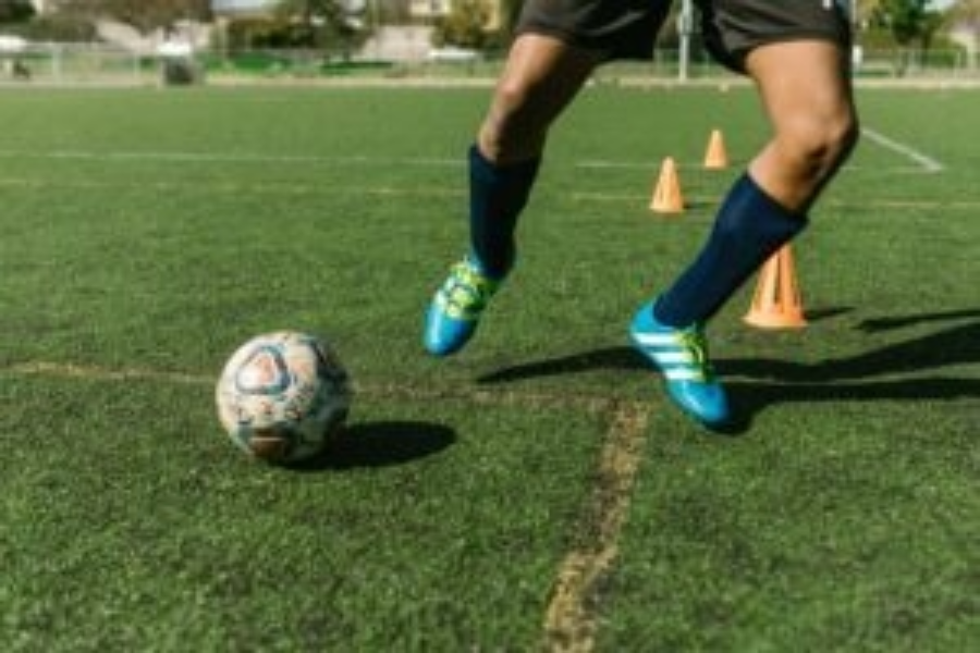 A person playing football.