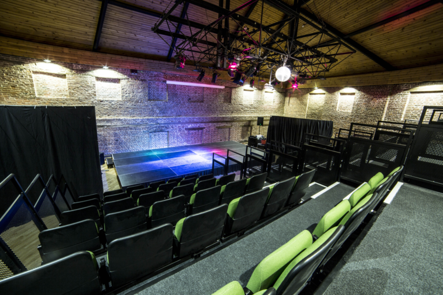 The stage and seating in the main theatre at Sam Newsom.