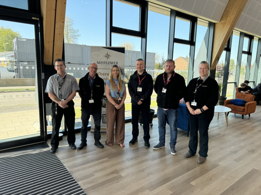 Group photo including representatives from Greenyard Frozen and Boston College Electrical staff