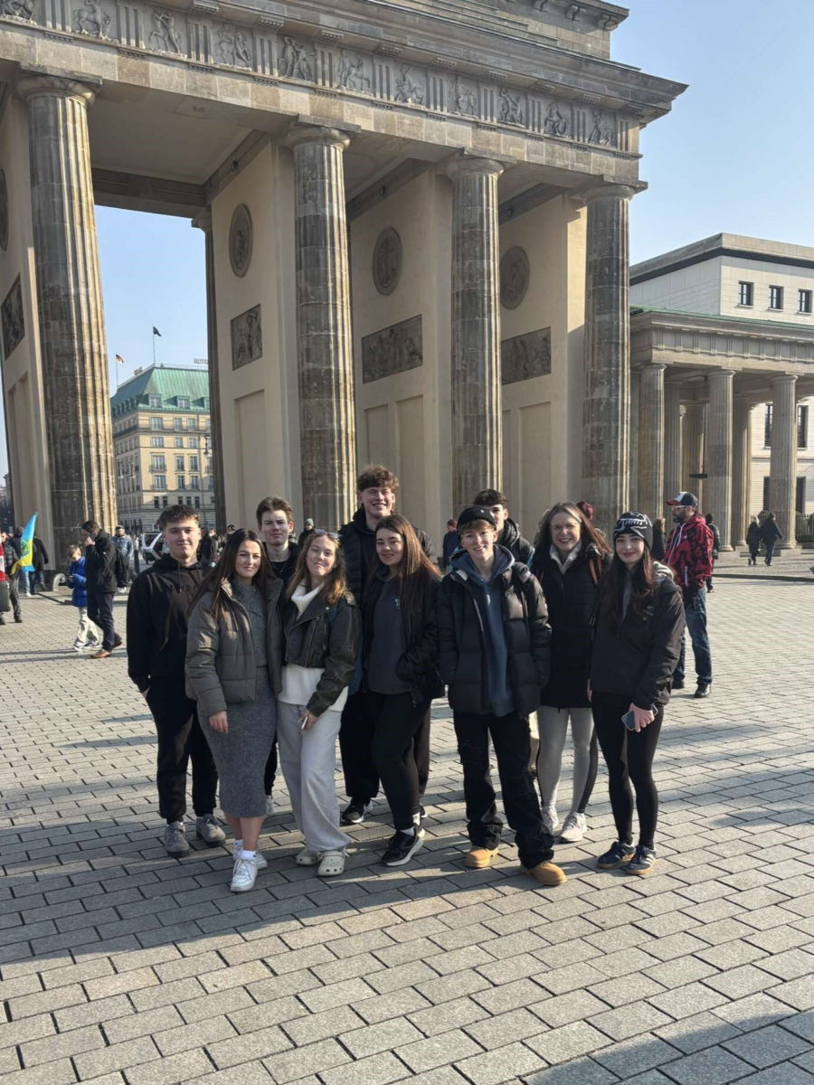 A group of Boston College student stood together in Germany on an international trip
