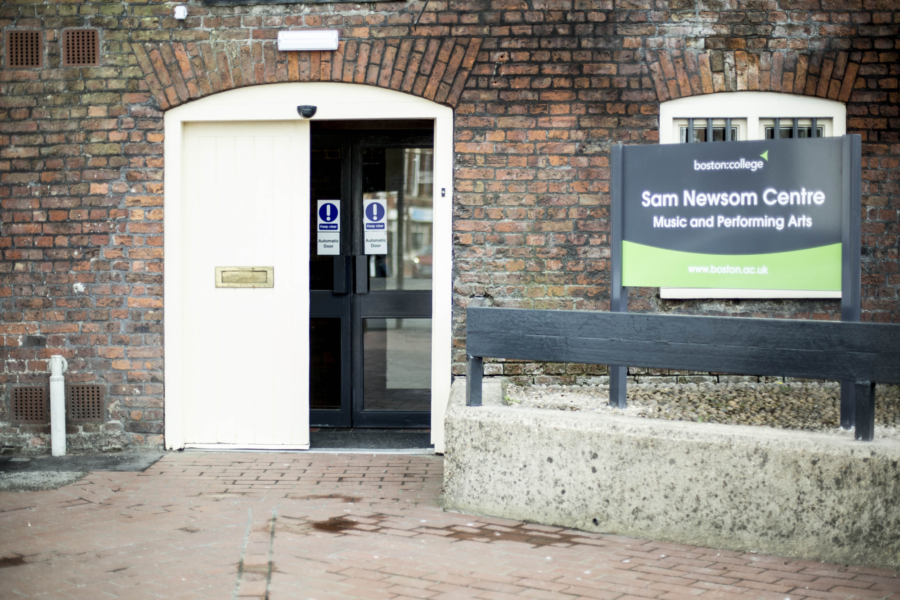 Entrance door to Sam Newsom.